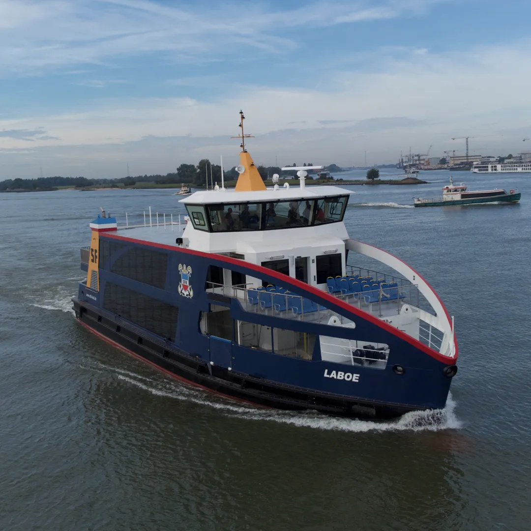 An electric ferry sailing on a river using CFD-optimized ship propellers