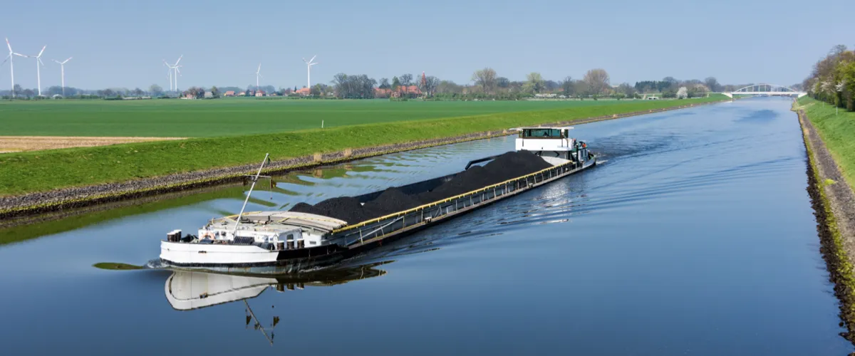 Inland vessel contributing to sustainability and complying with ISO 14083