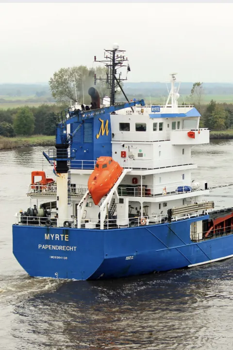 Coastal vessel Myrte sailing on a river, equipped with a Pre-Swirl Stator (PSS) for fuel savings and CO2 reduction