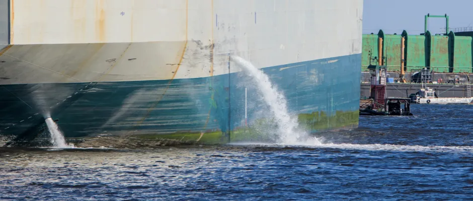 This ship is discharging ballast water using a UV-based BWTS, compliant with the U.S. Coast Guard (USCG) standards